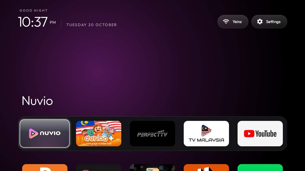The new home screen: clock, greeting, and a dock of five apps